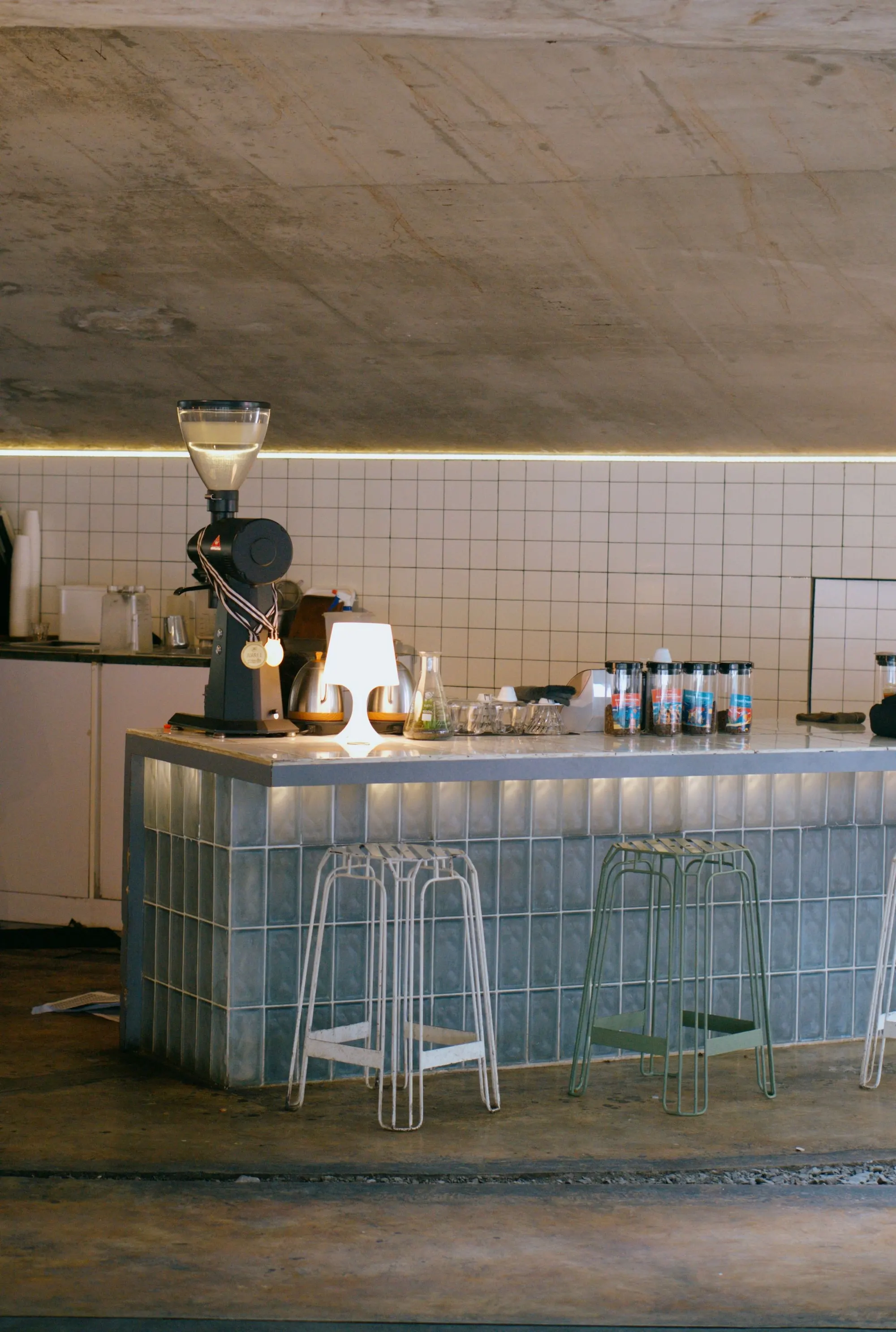 Tiled cafe bar with stools