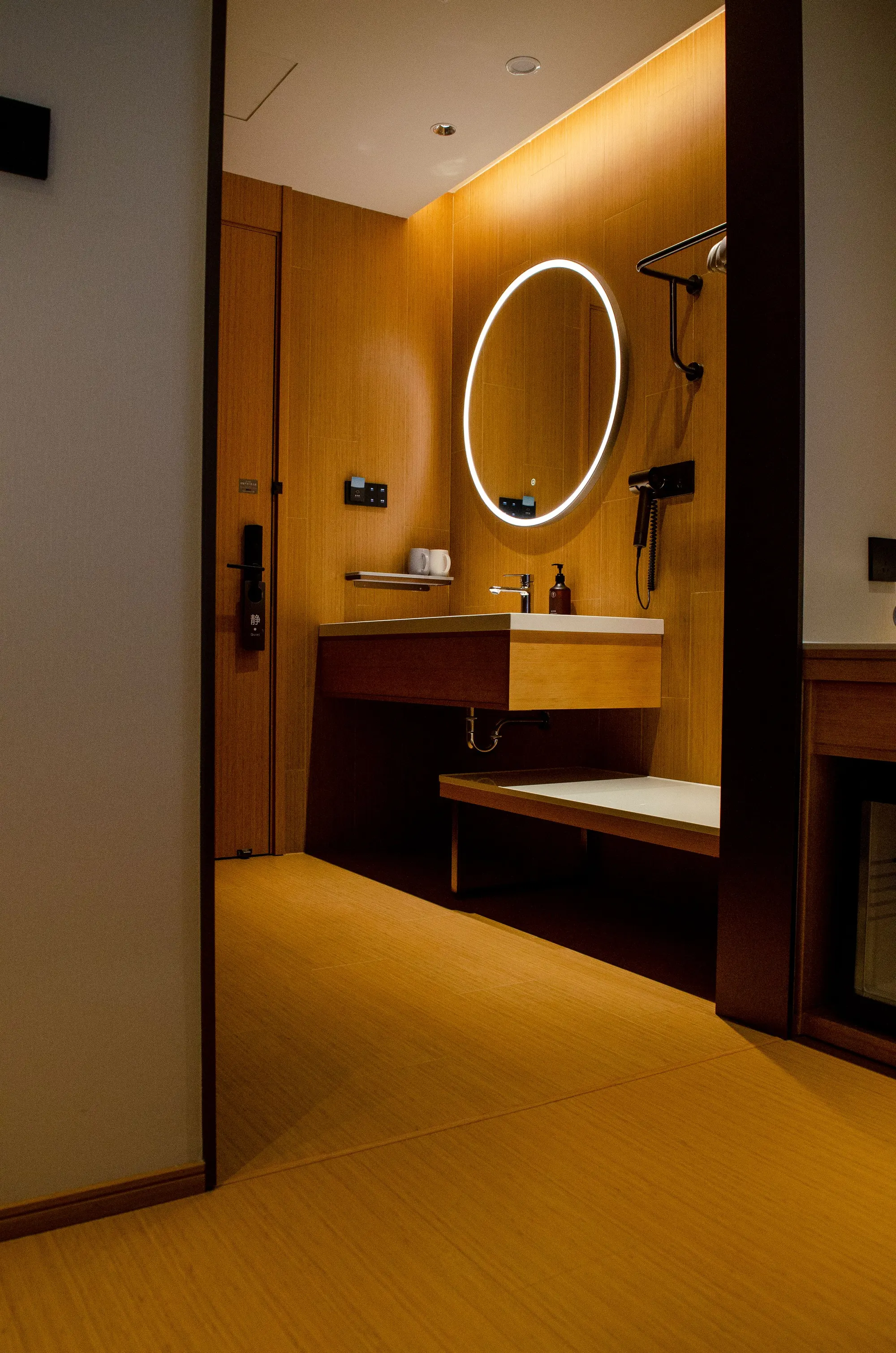 Warm-toned hotel bathroom